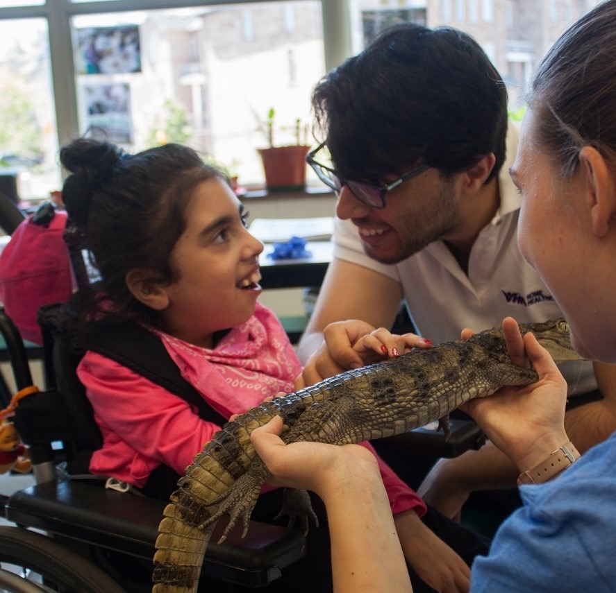 A VHA client enjoys a Playdate session