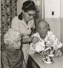 Sepia photo pf PSW with two of her elderly clients
