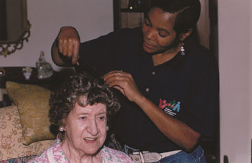 PSW doing her client's hair