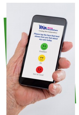 Person holding mobile phone looking at VHA's Smiley App