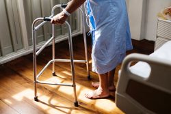 Elderly hospital patient with a walker