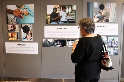 Woman looking at research display board