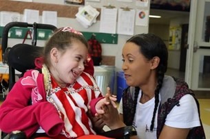 Child with support worker