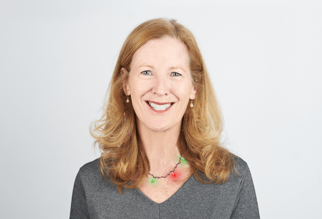 Carol Annett of VHA with festive lights necklace