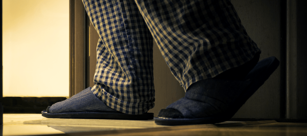 Close up of walking feet in slippers