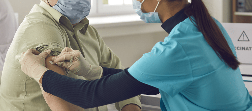 Man receiving vaccine