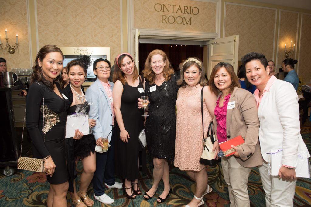 Carol Annett poses with a group of VHA Personal Support Workers at a staff appreciation event