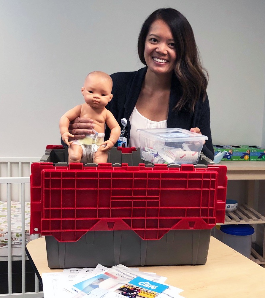 A Connected Care on the Go! box is packed with paediatric training supplies like teaching dolls and other aids