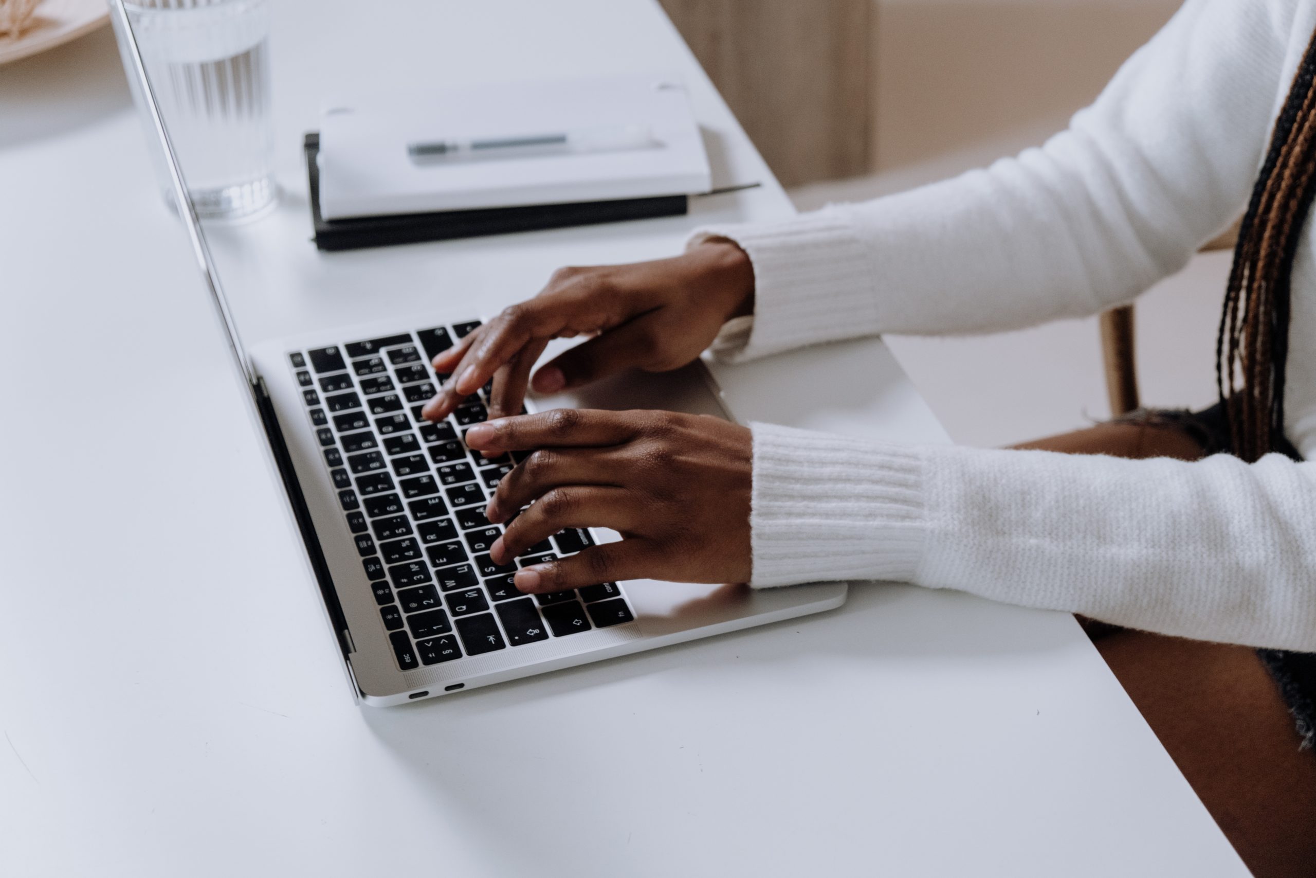 someone typing on a computer