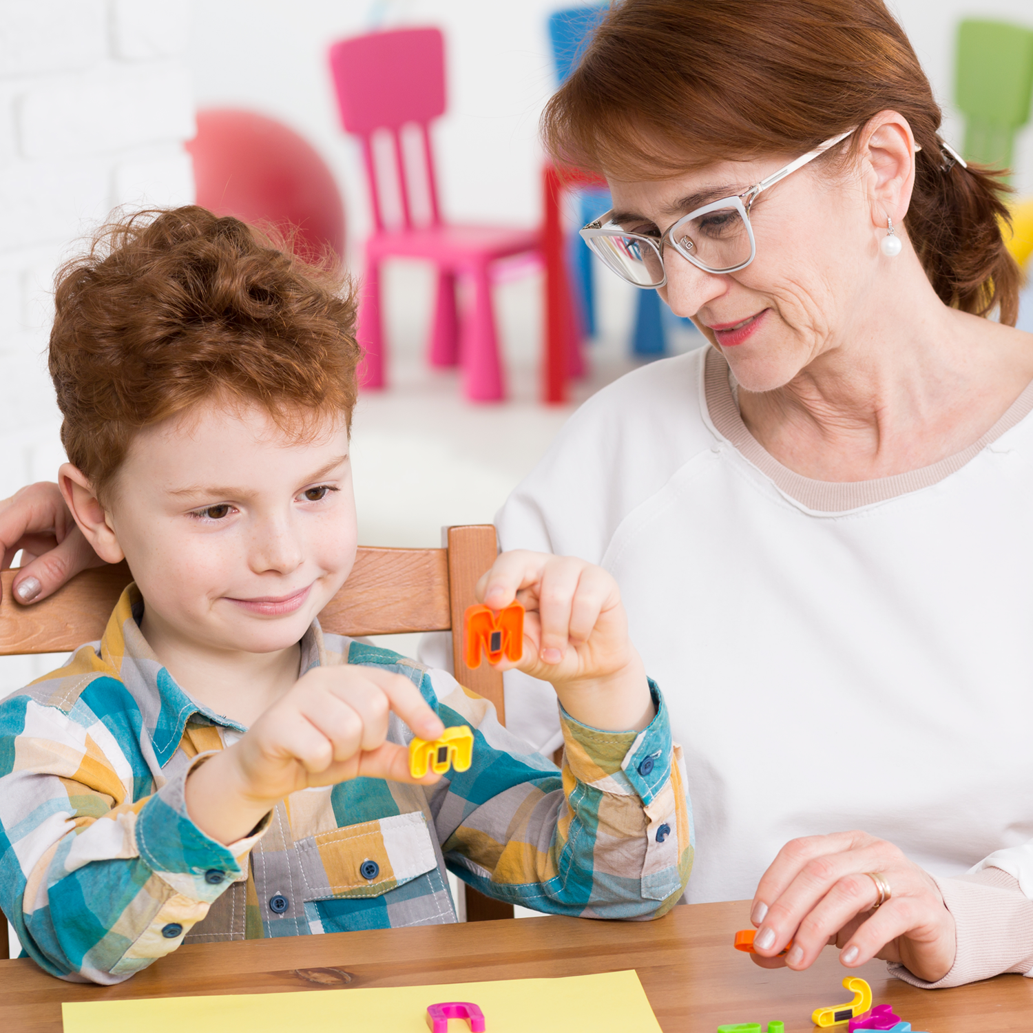 Occupational therapist with child