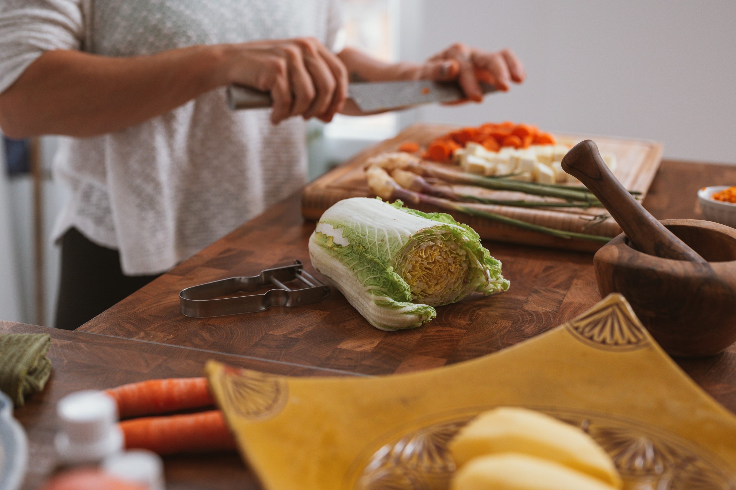 A person cutting vegetables