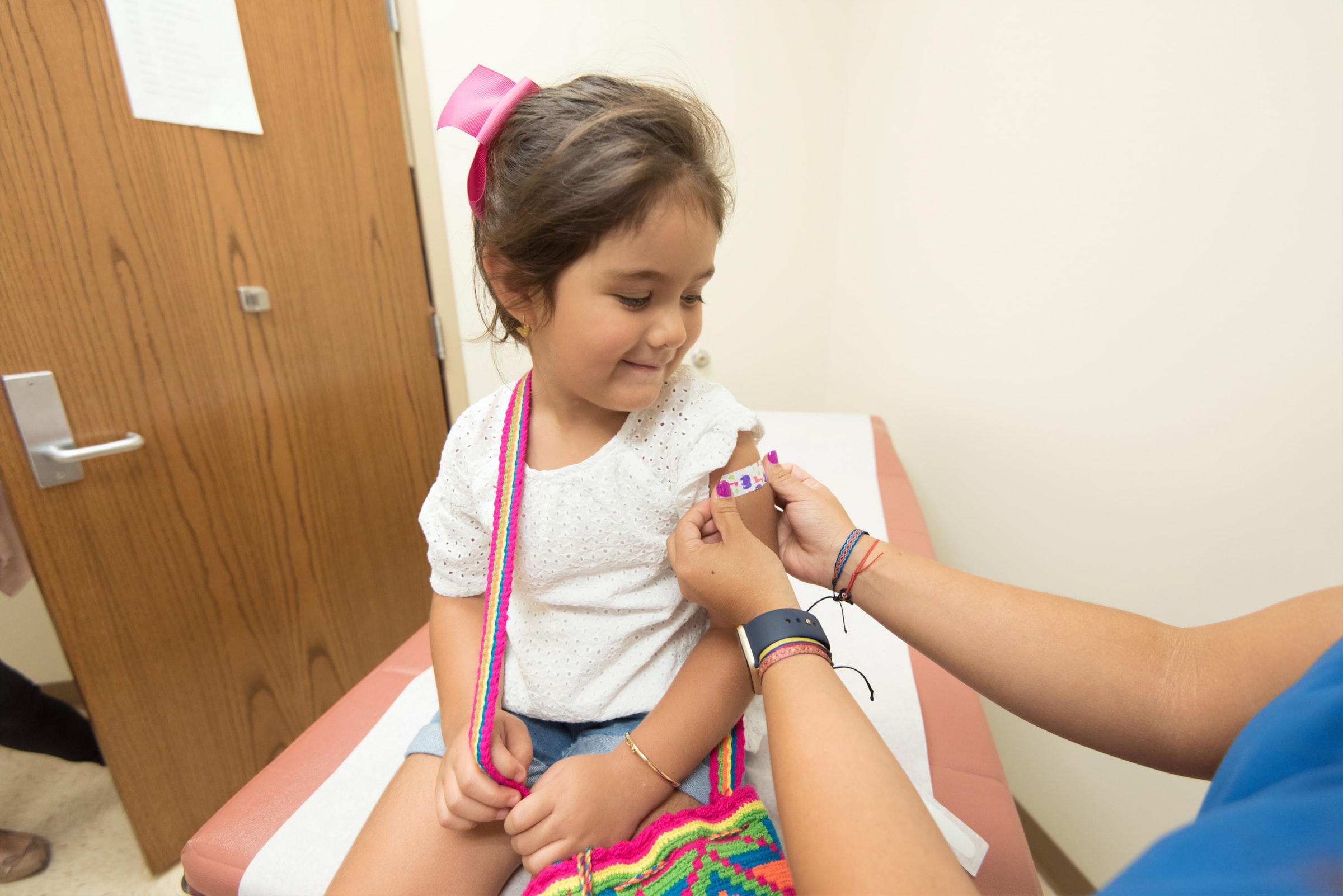 A girl getting her vaccine
