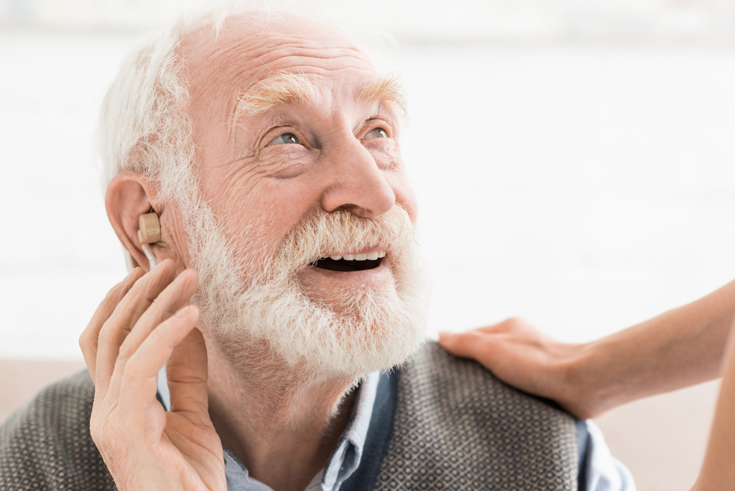 Senior with Hearing Aid