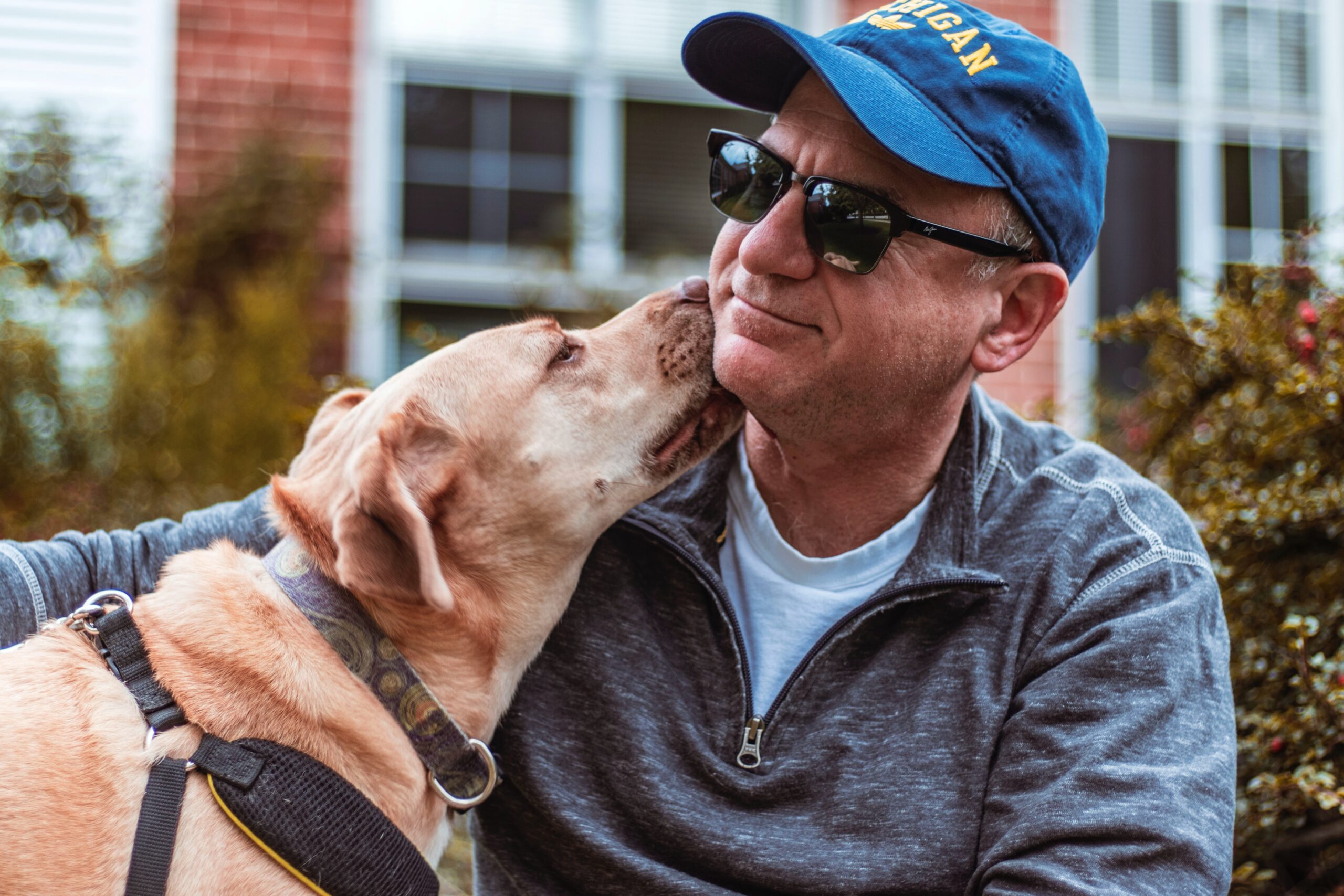 Senior man outdoors with dog