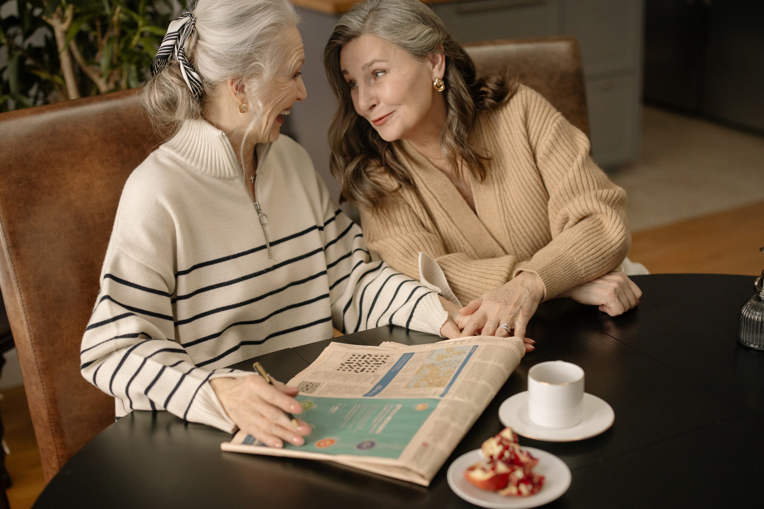 2 older women laughing together