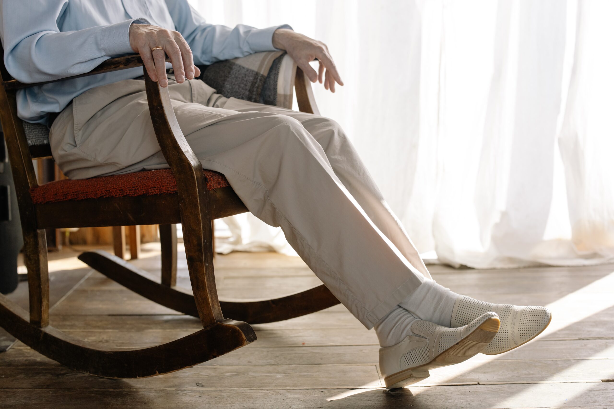 Senior seated in rocking chair