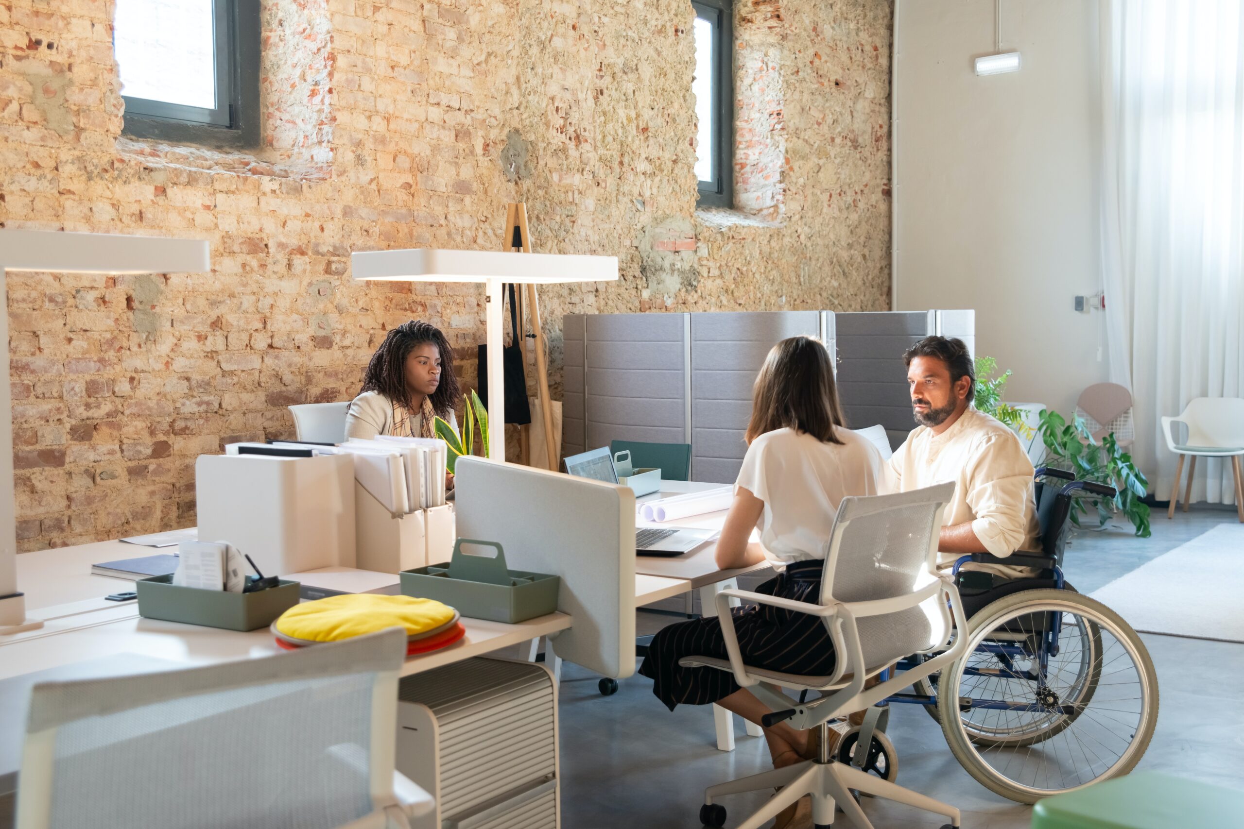 Coworkers sitting at a desk