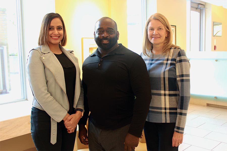 3 VHA staff members pose together for a photo