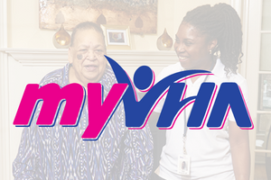 MyVHA watermark over photo of staff and client