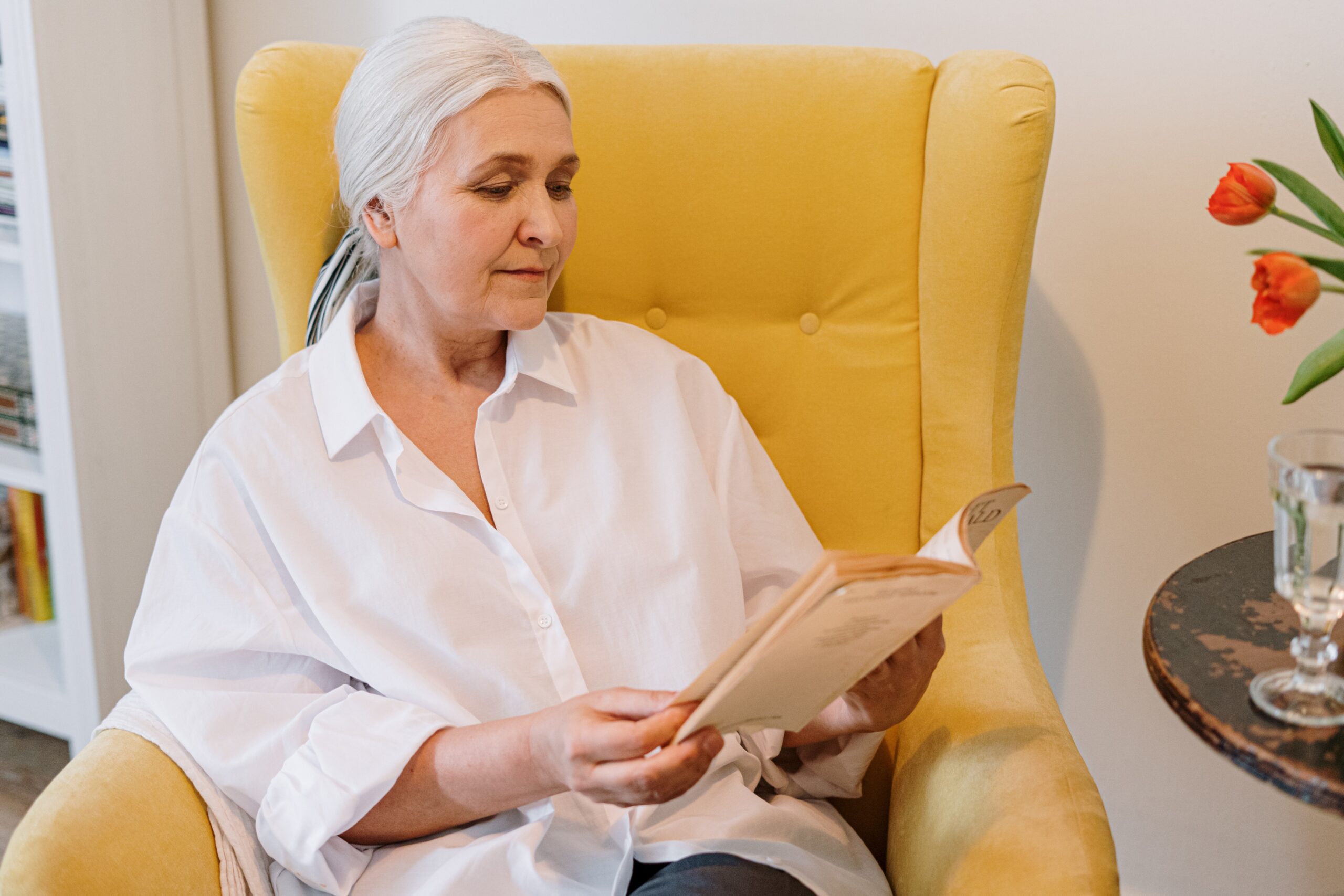 Older woman reading in chair