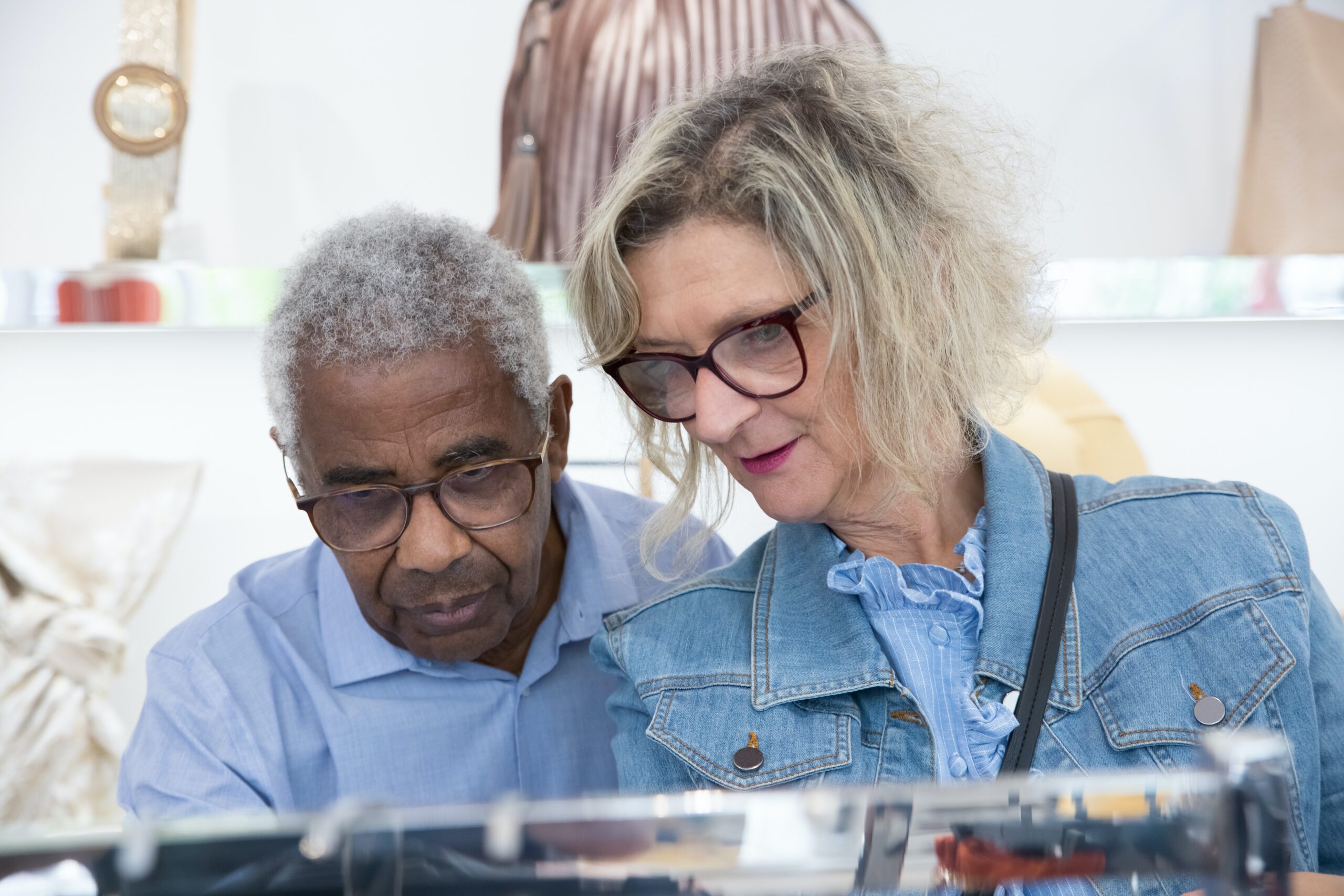 Woman and man shop in glasses