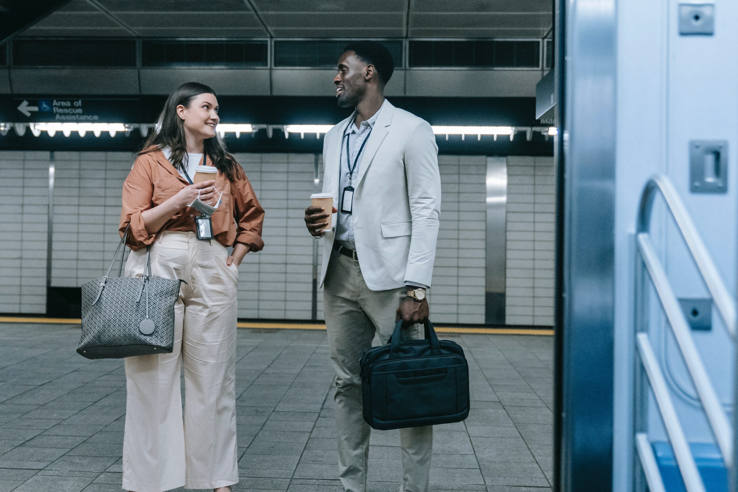 woman and man waiting for subway