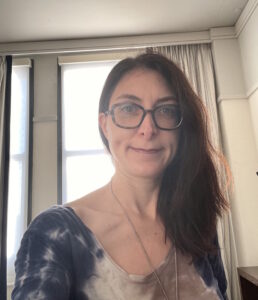Occupational Therapist Deborah Spivak smiling in front of a window