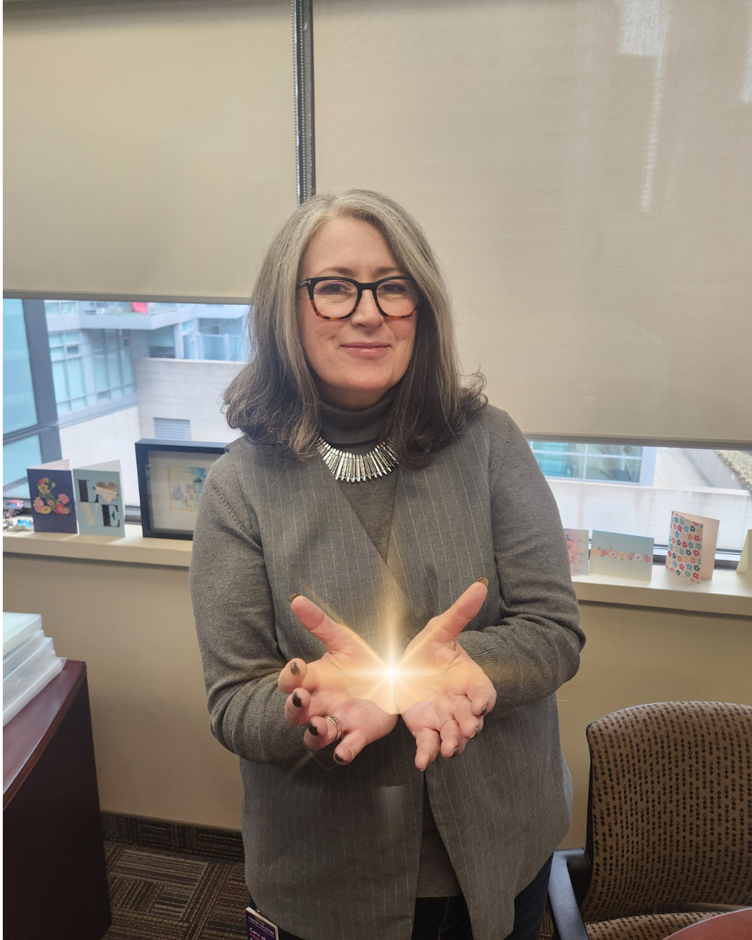 Kelley Myers holding a spark in her hands