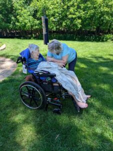 Client Marion and daughter Suzanne in Marion's backyard.